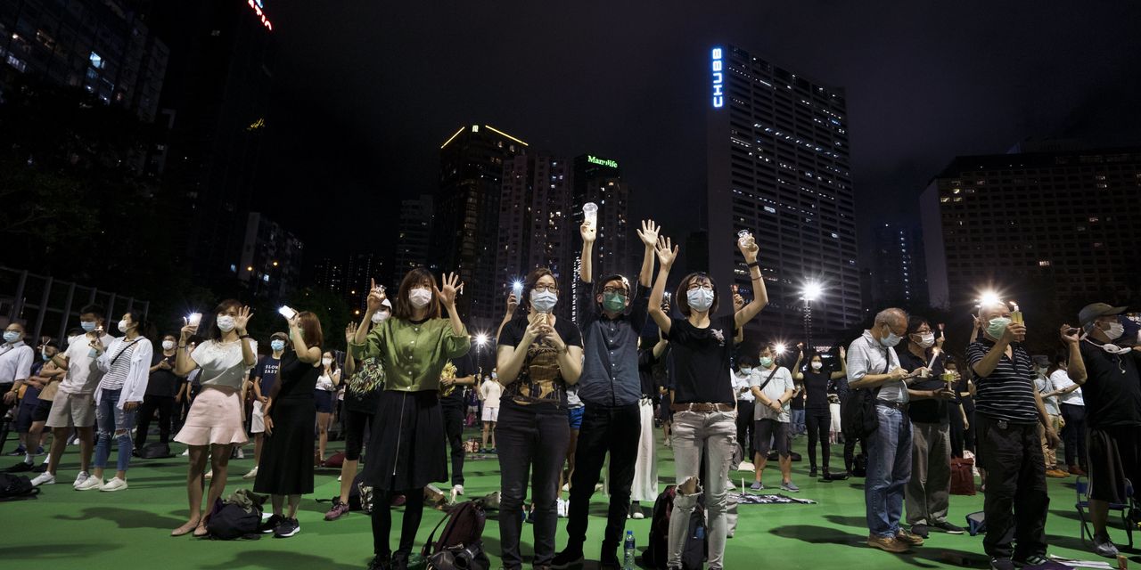 Thousands Defy Beijing With Hong Kong Vigil for Tiananmen Victims