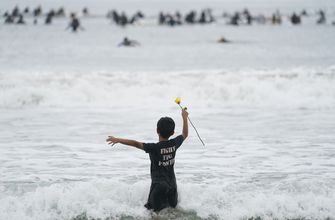 Surfers ‘shuffle out,’ circle up in memory of George Floyd