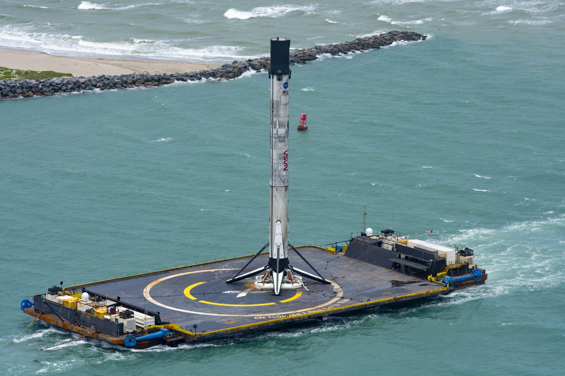 SpaceX test-fires rocket for South Korean navy satellite birth this week