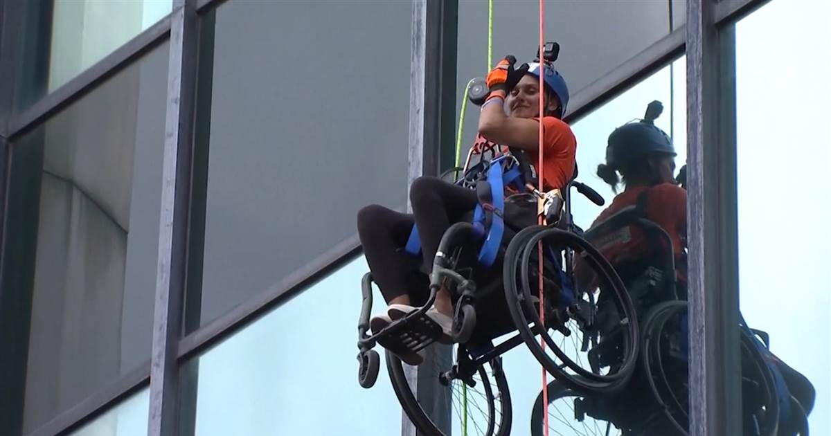Ohio girl rappels down skyscraper in wheelchair