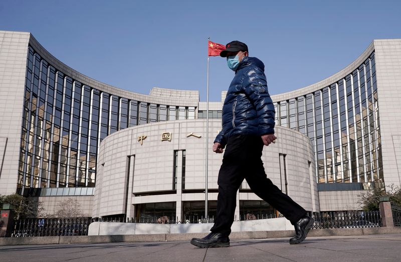 China’s unlicensed asset management corporations aloof a threat, central bank executive says