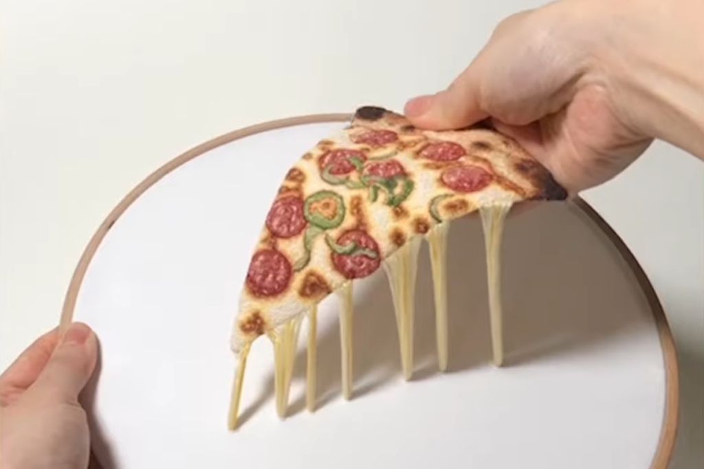 Extremely practical food embroidery with a tips boggling pizza “cheese pull”