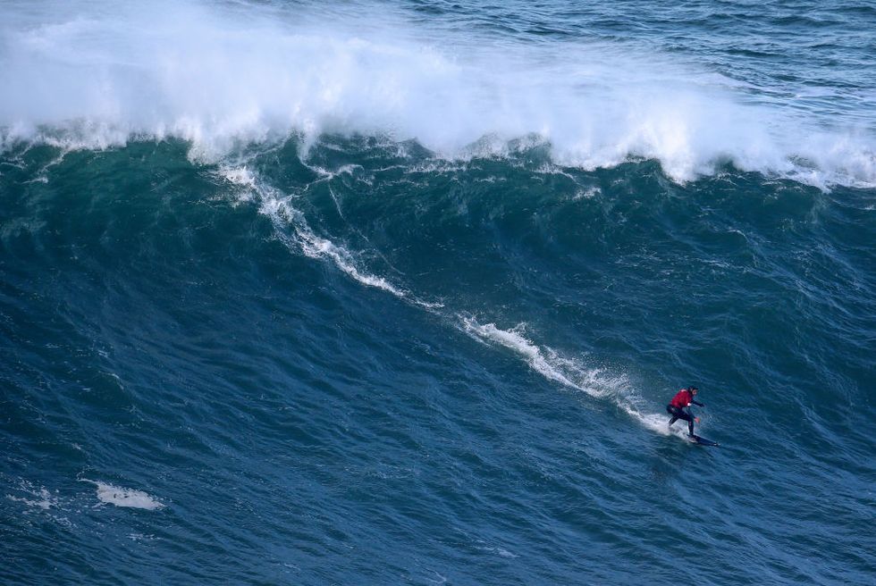 This Lady Prison Broke the World File for Highest Wave Ever Surfed