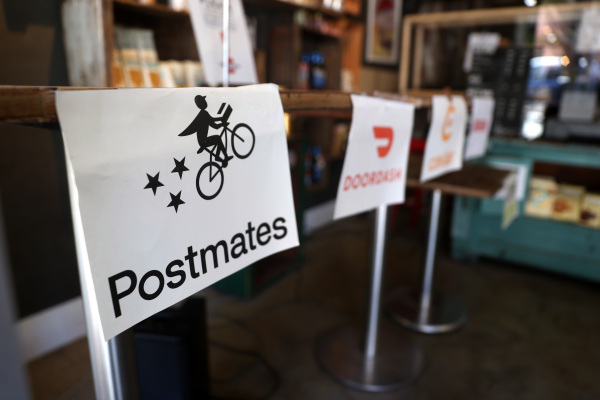 Postmates cuts losses in Q2 because it heads towards tie-up with Uber