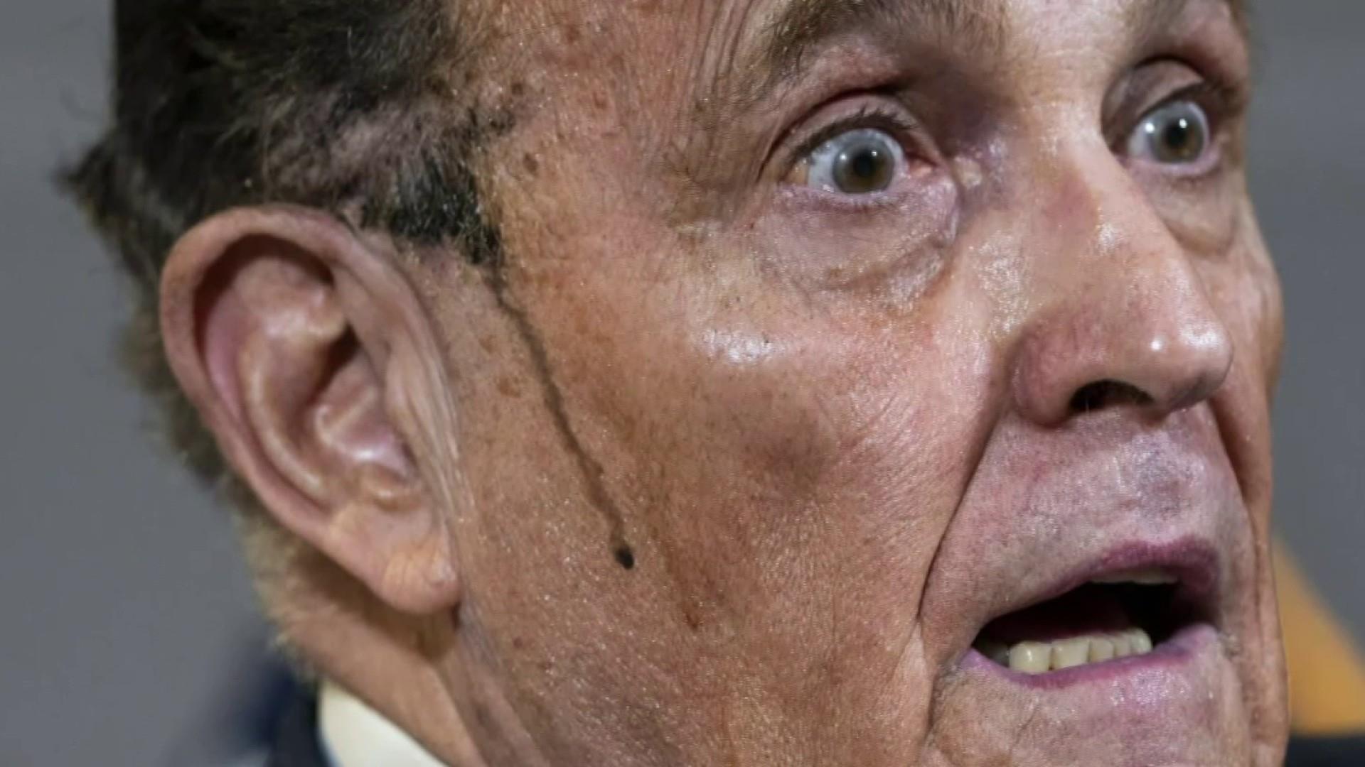 Trump lawyer Giuliani lies and sweats via chaotic presser