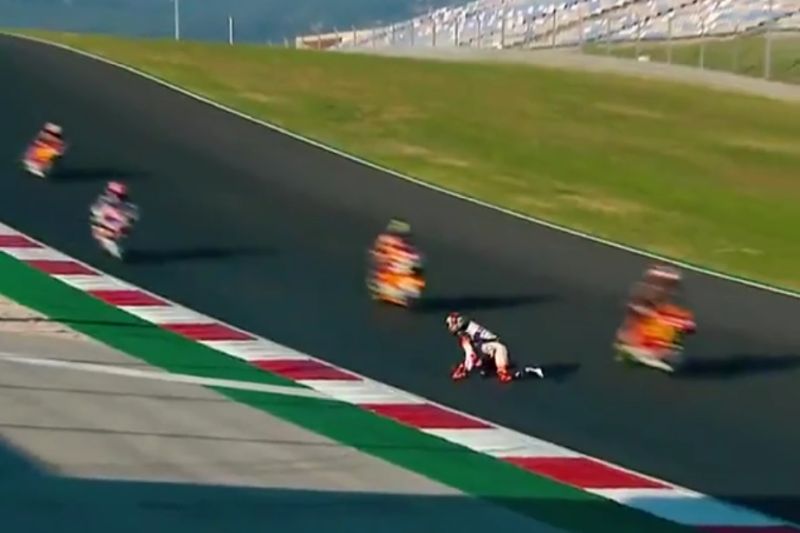 MotoGP rider barely manages to dodge bikes after falling