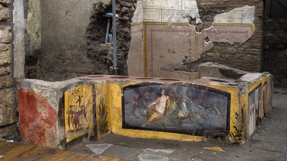 Shots floor of a superbly preserved musty Roman rapid meals stand in Pompeii