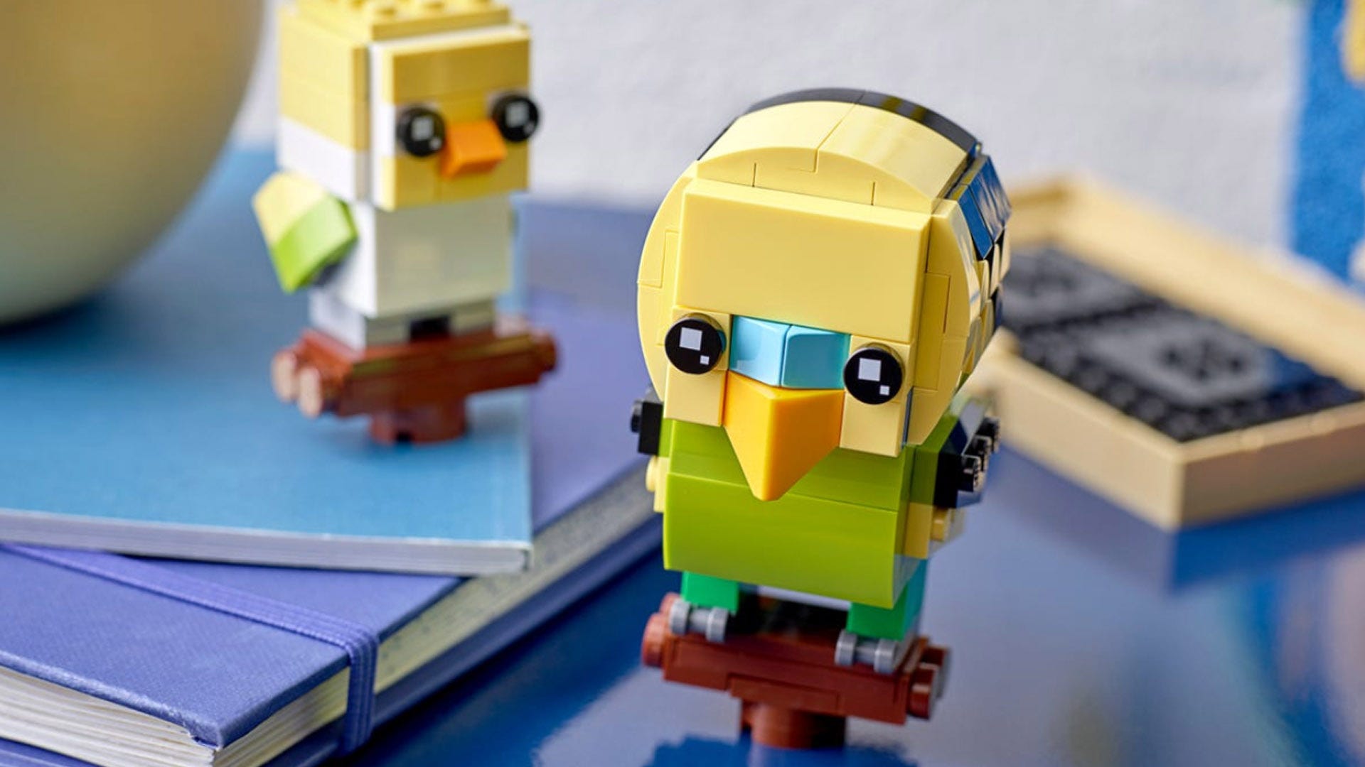 LEGO’s Latest BrickHeadz Are Unprejudiced Bobble-Headed Fish and Hen Pets
