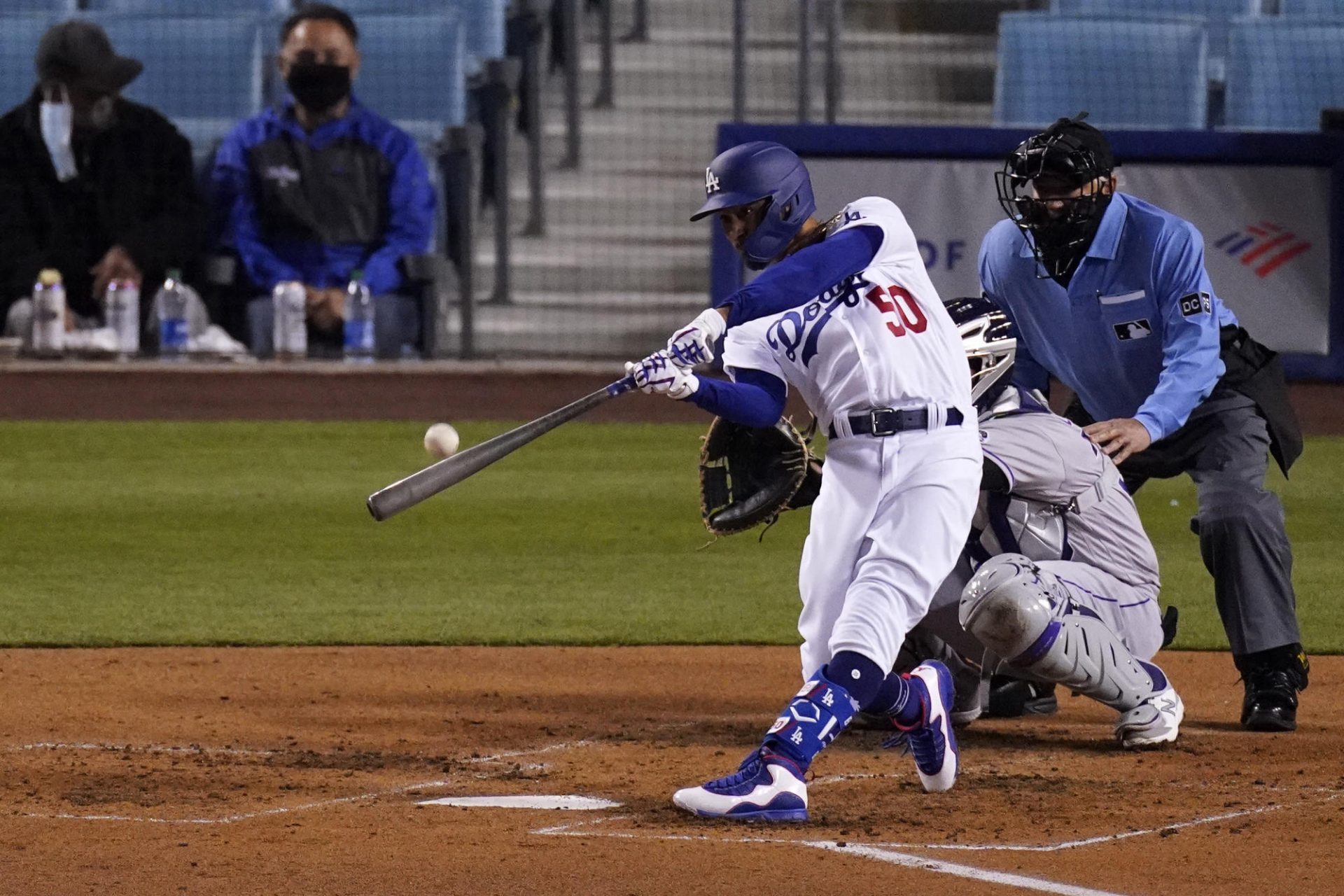 Betts, Bauer star for original fans as Dodgers crush Rockies 7-0