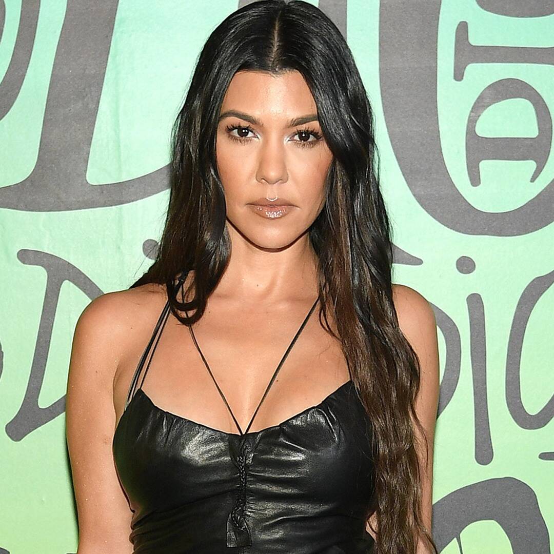 Kourtney Kardashian Flashes Blinged-Out Grills While Posing In Horny Lingerie