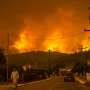 Determined Greeks cruise as fires ravage Evia island