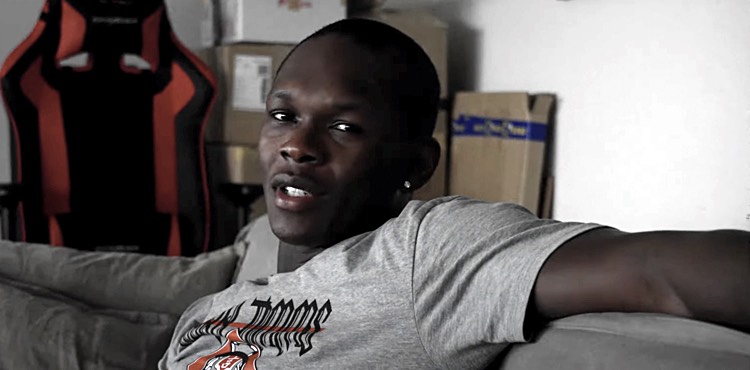 Peek middleweight champion Israel Adesanya react to UFC 265 | Video