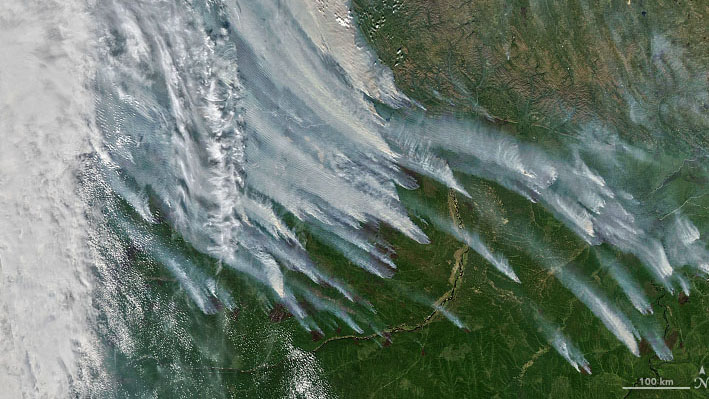 Siberian wildfires double greenhouse gasoline emission file: That is how they glance from home.