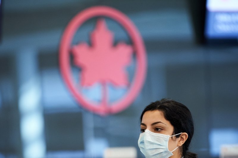 Air Canada points COVID-19 vaccine mandate for staff