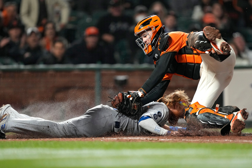 Dodgers fall to Giants in 11 innings on dear throwing error
