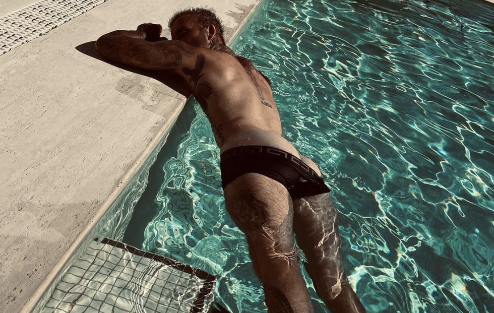 Victoria Beckham Shared a ‘Cheeky’ Photo of David Beckham Stress-free Poolside