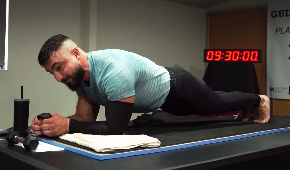 Glimpse This Guy Shatter the World Document for Longest Plank of All Time