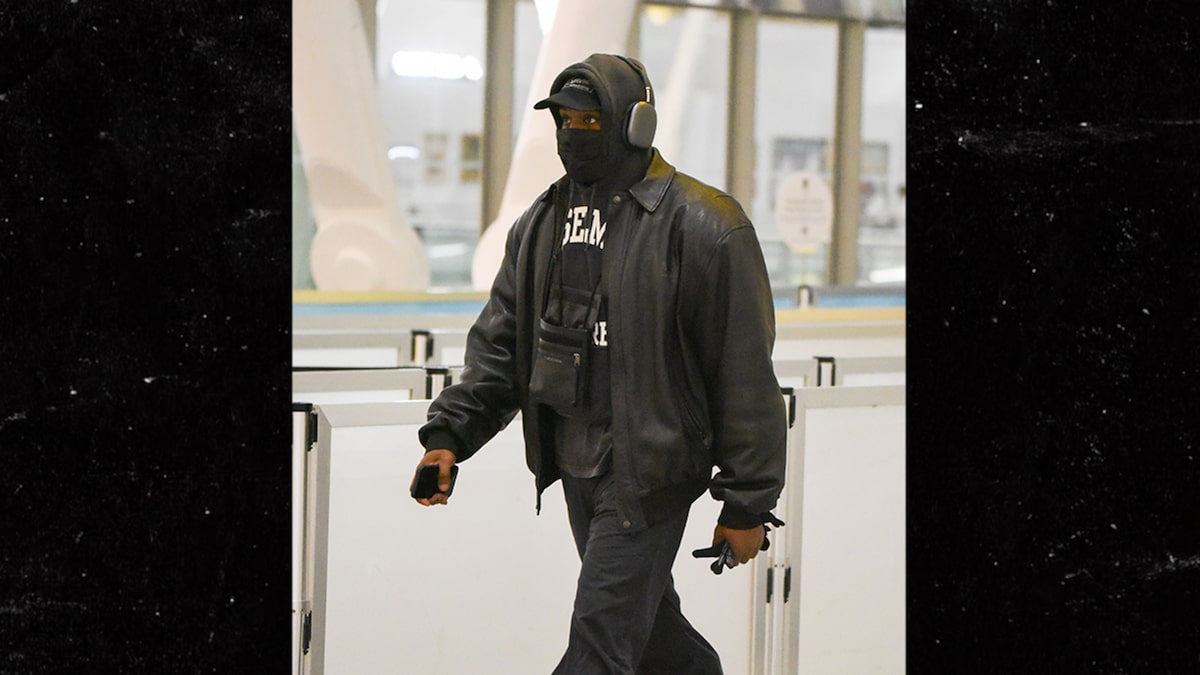 Kanye West Walking By plan of Airport Take care of Moderate Joe