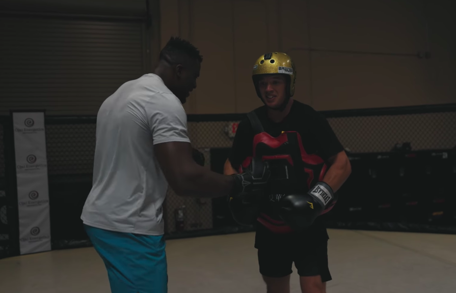 Peruse UFC Vital person Francis Ngannou Punch BMX Pro Ryan Williams Square in the Chest