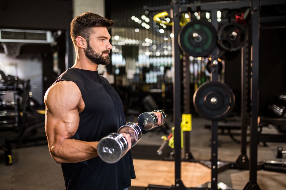 Indulge in Greater Biceps By Including Bands to Your Dumbbell Curls