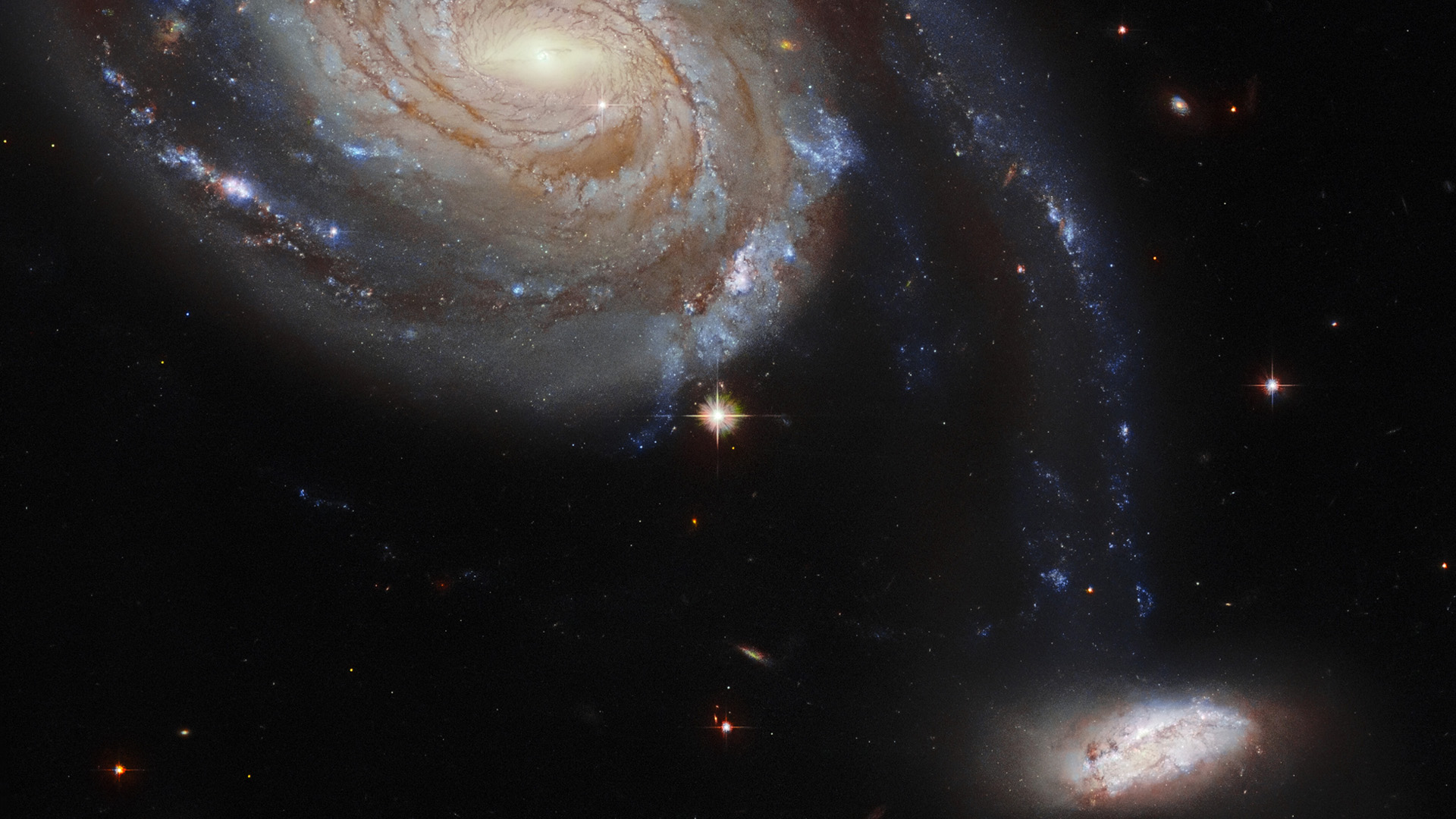 Hubble telescope spots a pair of ‘squabbling’ galaxies locked in cosmic dance