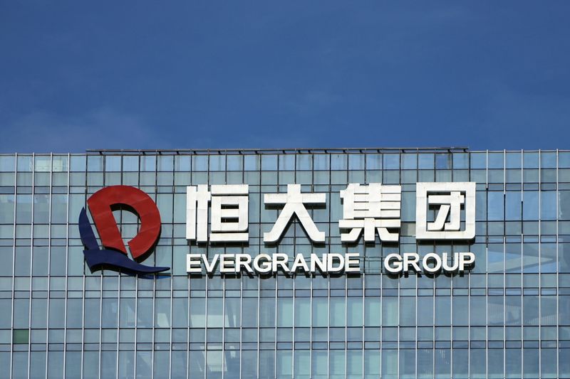 China Evergrande’s EV unit shares surge on change shift, Evergrande sinks